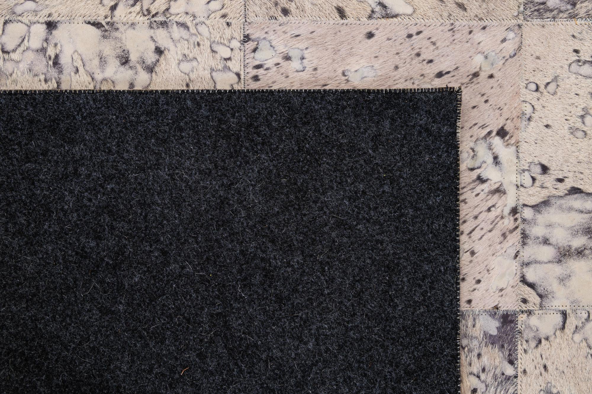 5' 4 x 8' 2 Cowhide - Patchwork Rug
