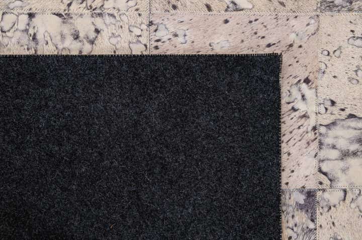 5' 4 x 8' 2 Cowhide - Patchwork Rug