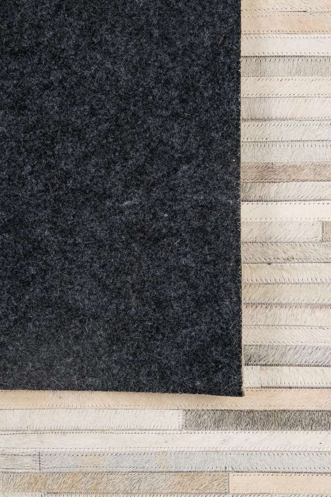 5' 1 x 8' 2 Cowhide - Patchwork Rug