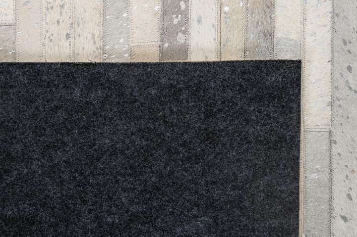 5' 2 x 7' 11 Cowhide - Patchwork Rug