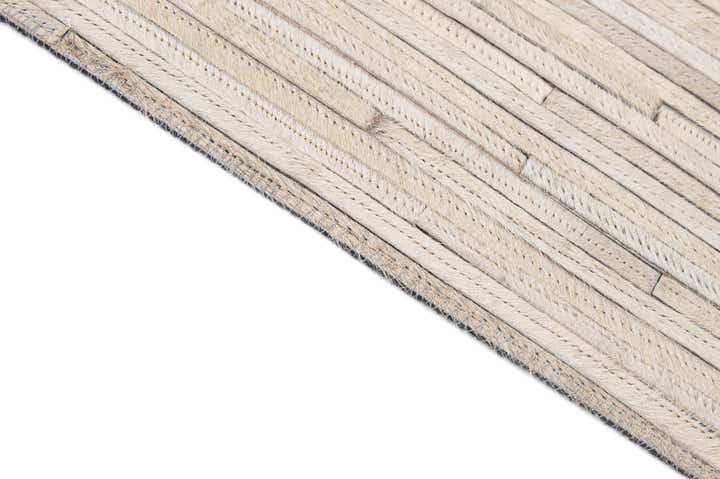5' 2 x 7' 11 Cowhide - Patchwork Rug