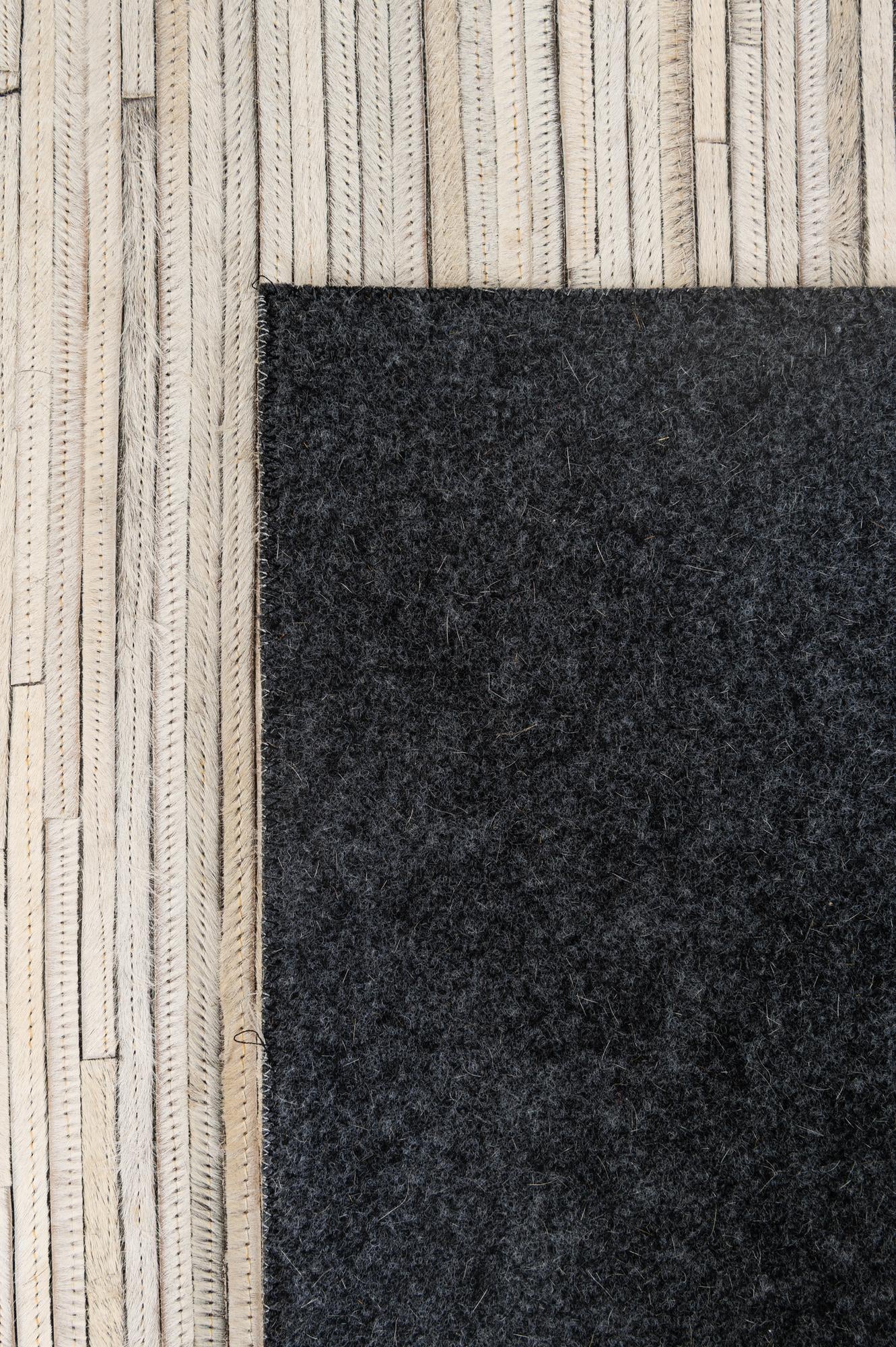 5' 2 x 7' 11 Cowhide - Patchwork Rug