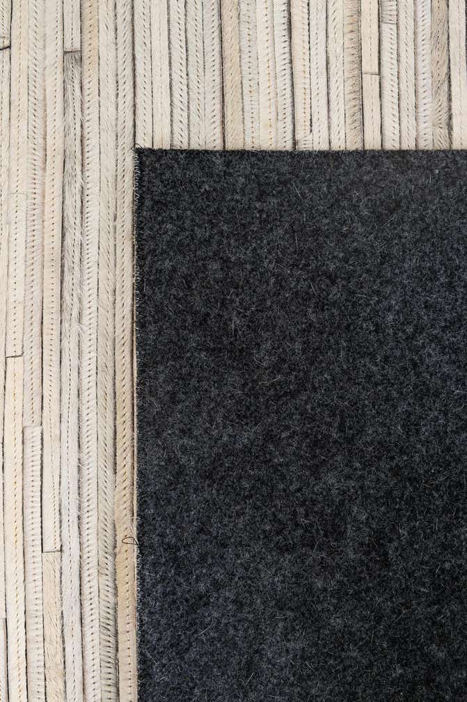 5' 2 x 7' 11 Cowhide - Patchwork Rug