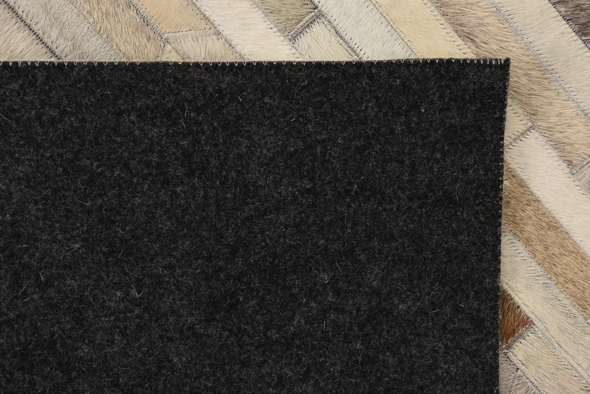 5' 1 x 8' 2 Cowhide Rug