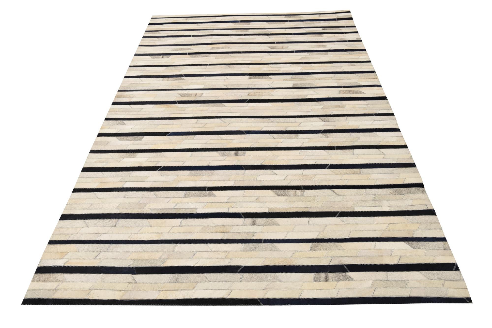 5' 1 x 8' 1 Cowhide Rug
