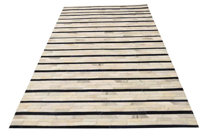5' 1 x 8' 1 Cowhide Rug