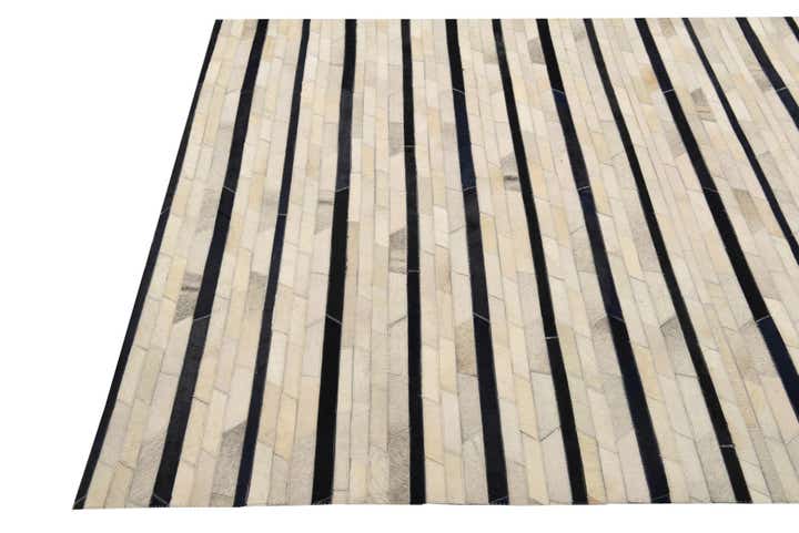 5' 1 x 8' 1 Cowhide Rug