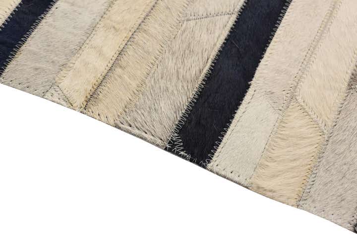 5' 1 x 8' 1 Cowhide Rug