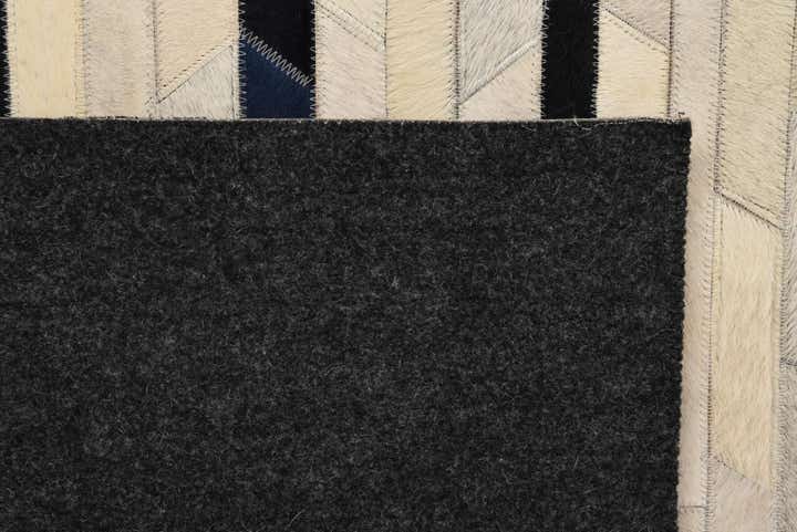 5' 1 x 8' 1 Cowhide Rug