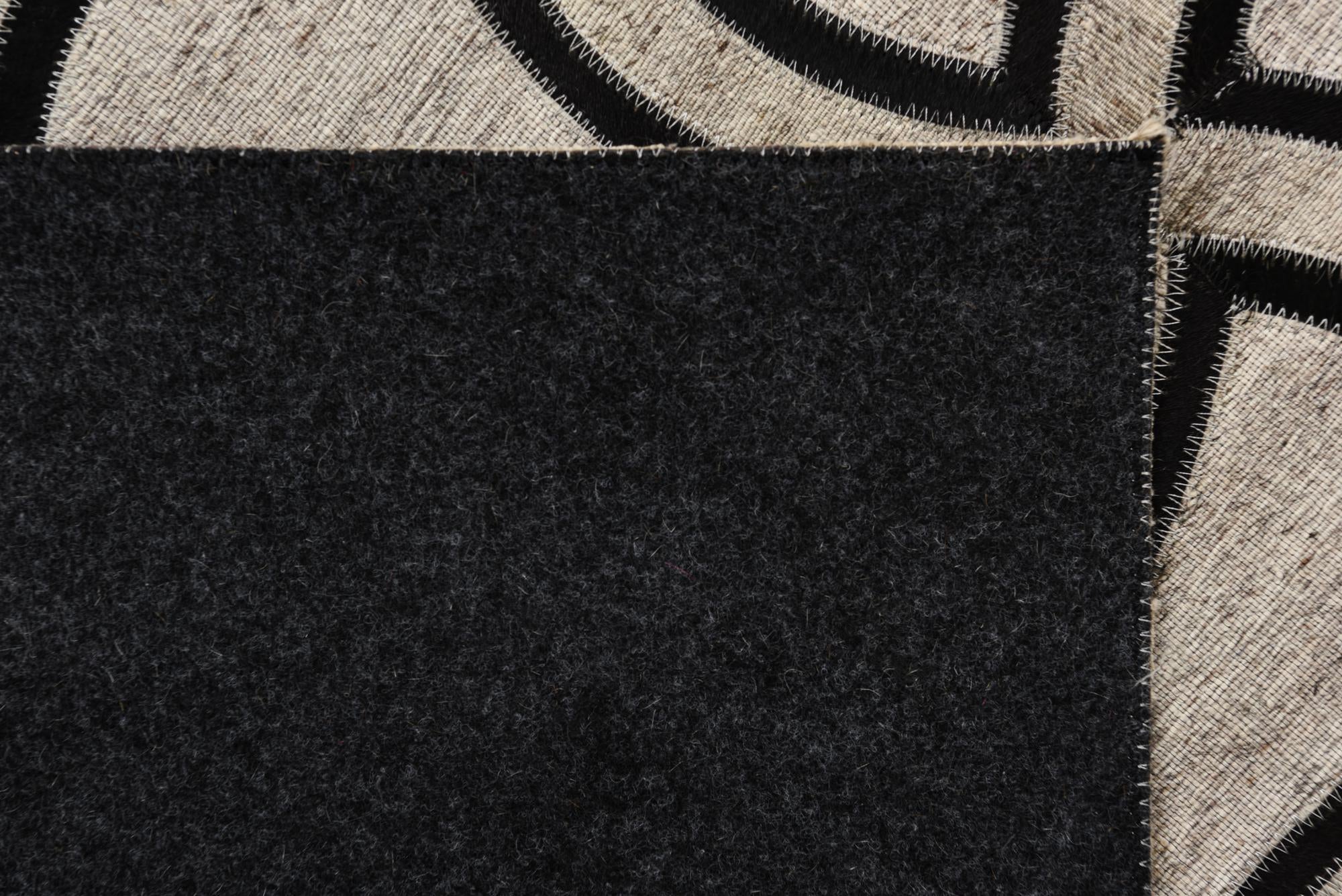 5' 1 x 8' 1 Cowhide Rug