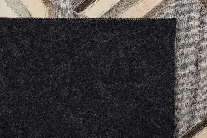 5' 4 x 8' Cowhide Rug
