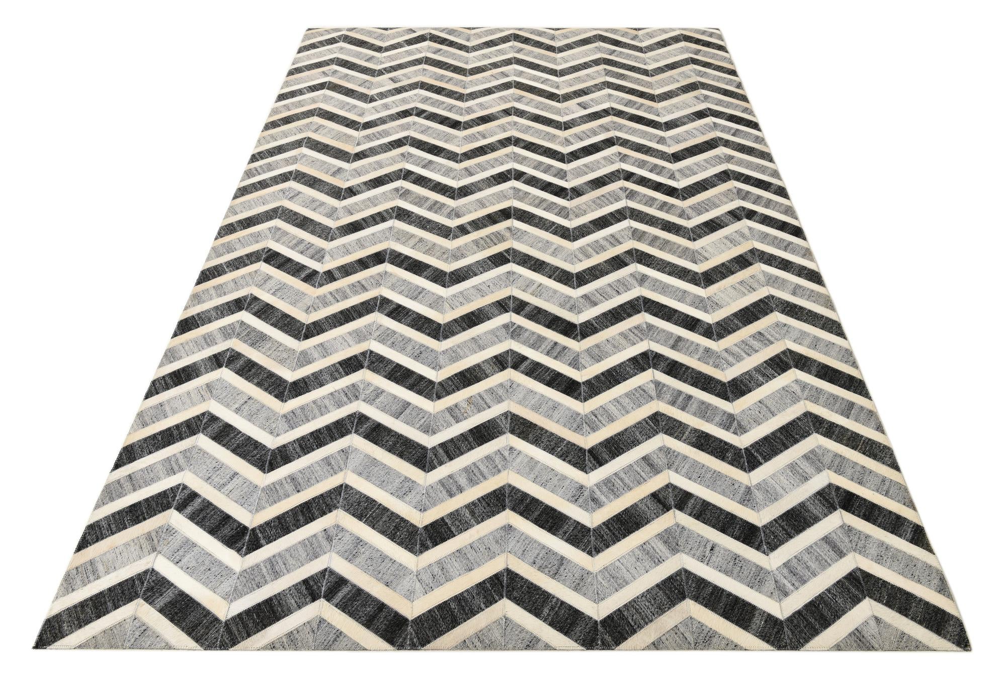 5' 2 x 7' 10 Cowhide Rug