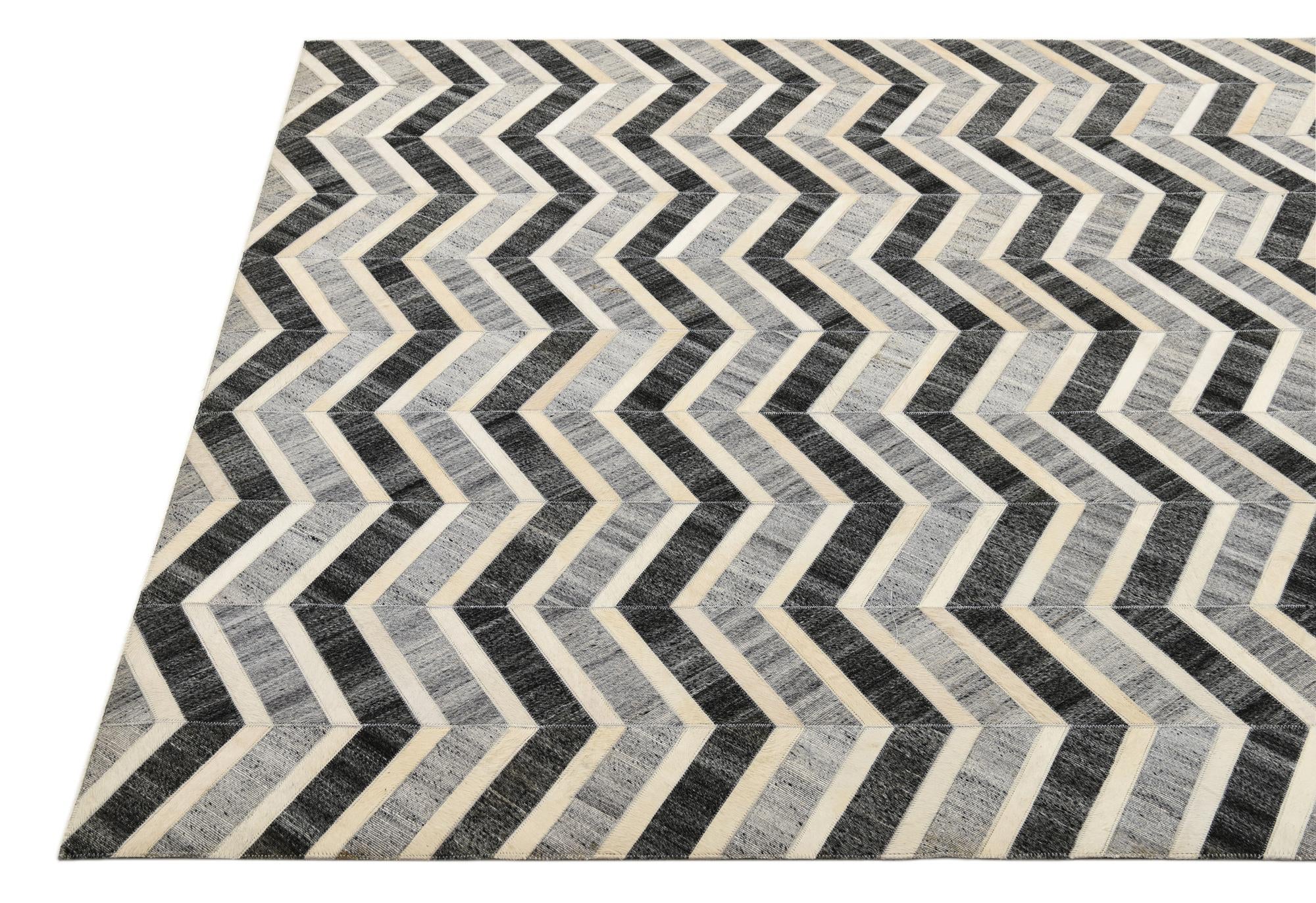 5' 2 x 7' 10 Cowhide Rug