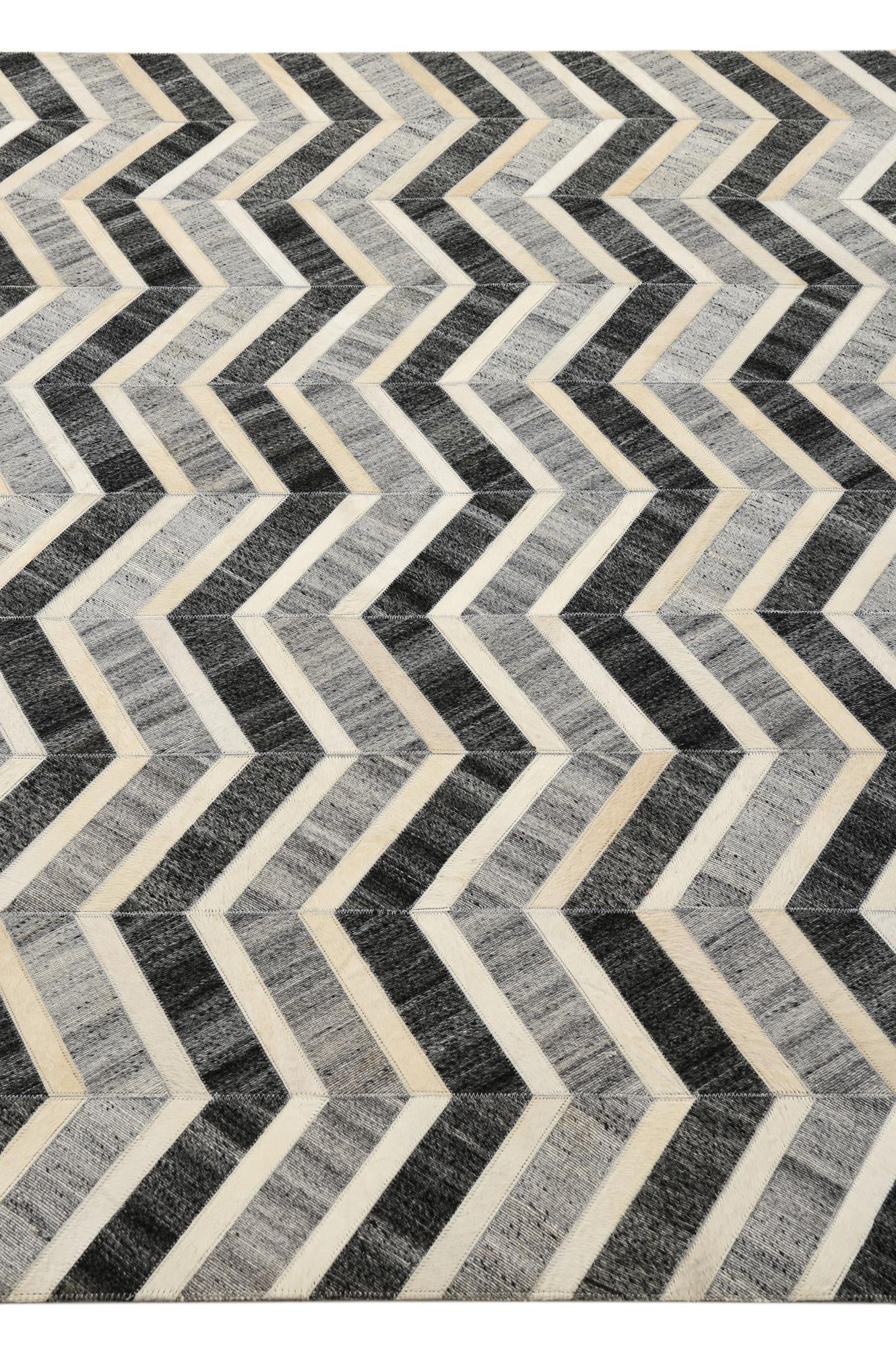 5' 2 x 7' 10 Cowhide Rug