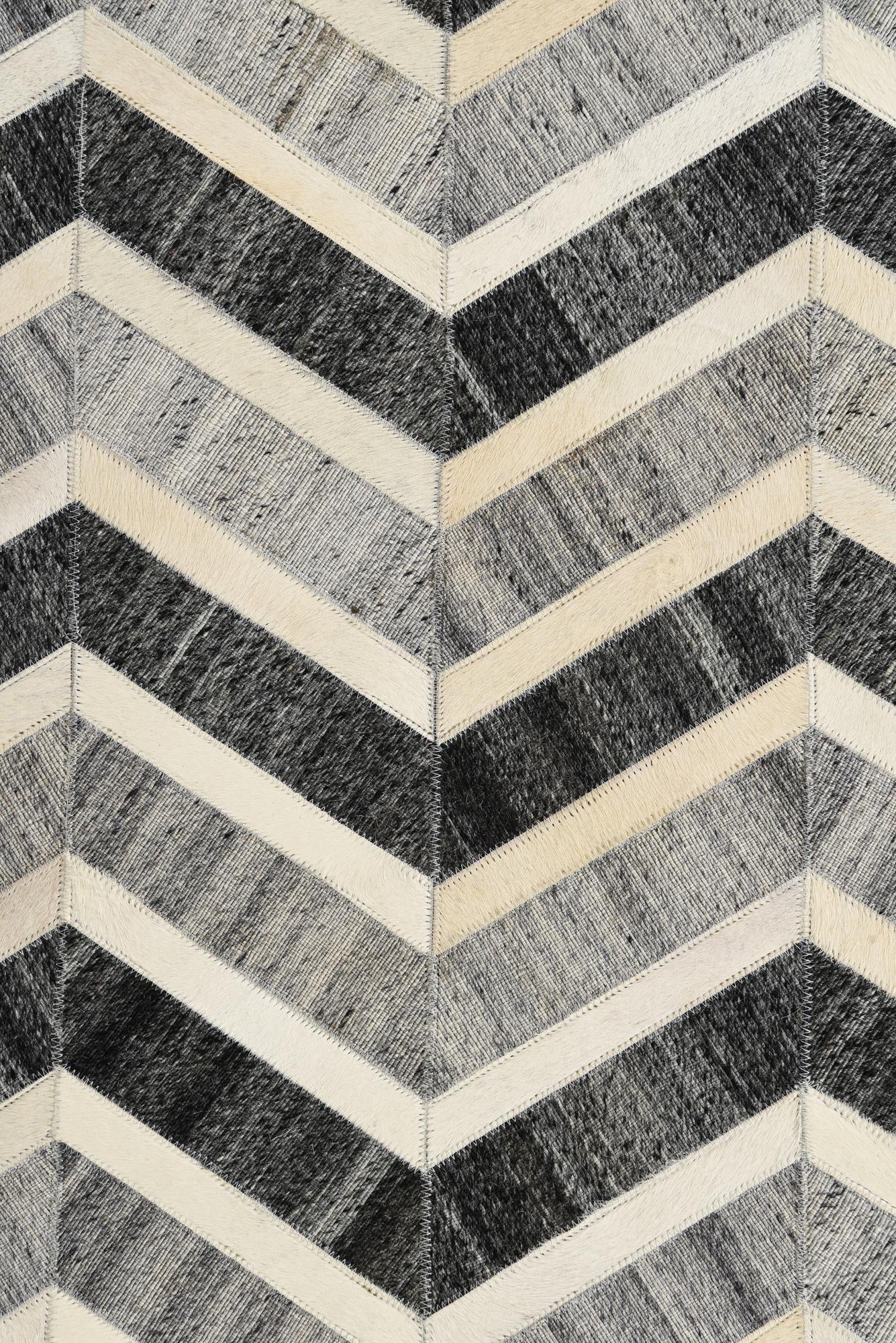 5' 2 x 7' 10 Cowhide Rug
