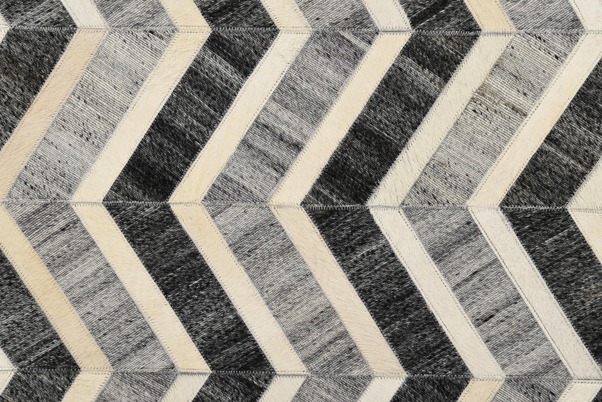 5' 2 x 7' 10 Cowhide Rug