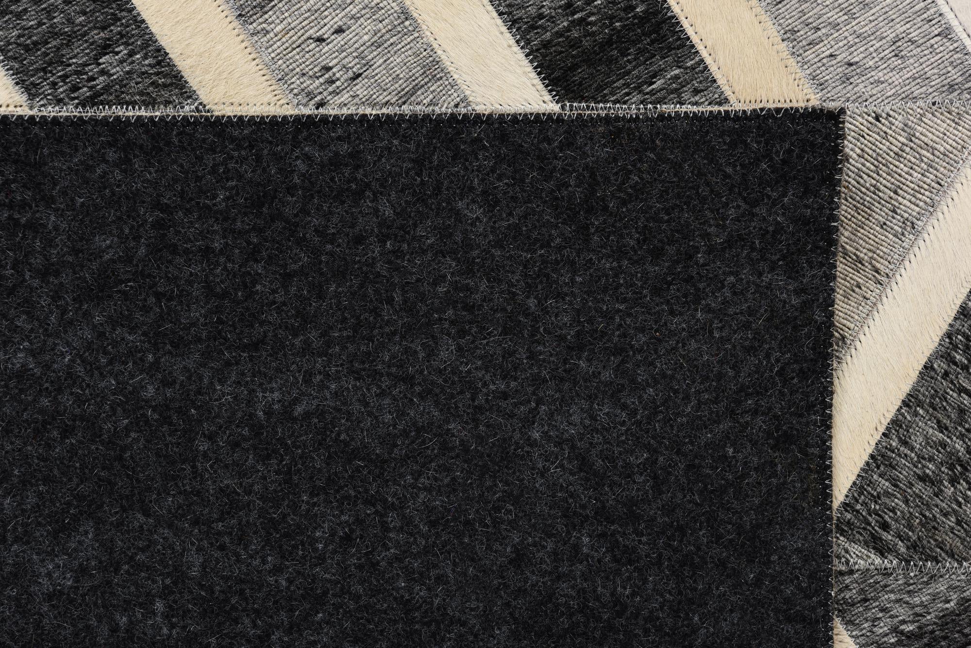 5' 2 x 7' 10 Cowhide Rug