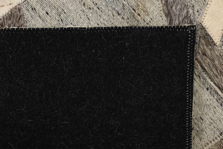 2' 1 x 3' 1 Cowhide Rug
