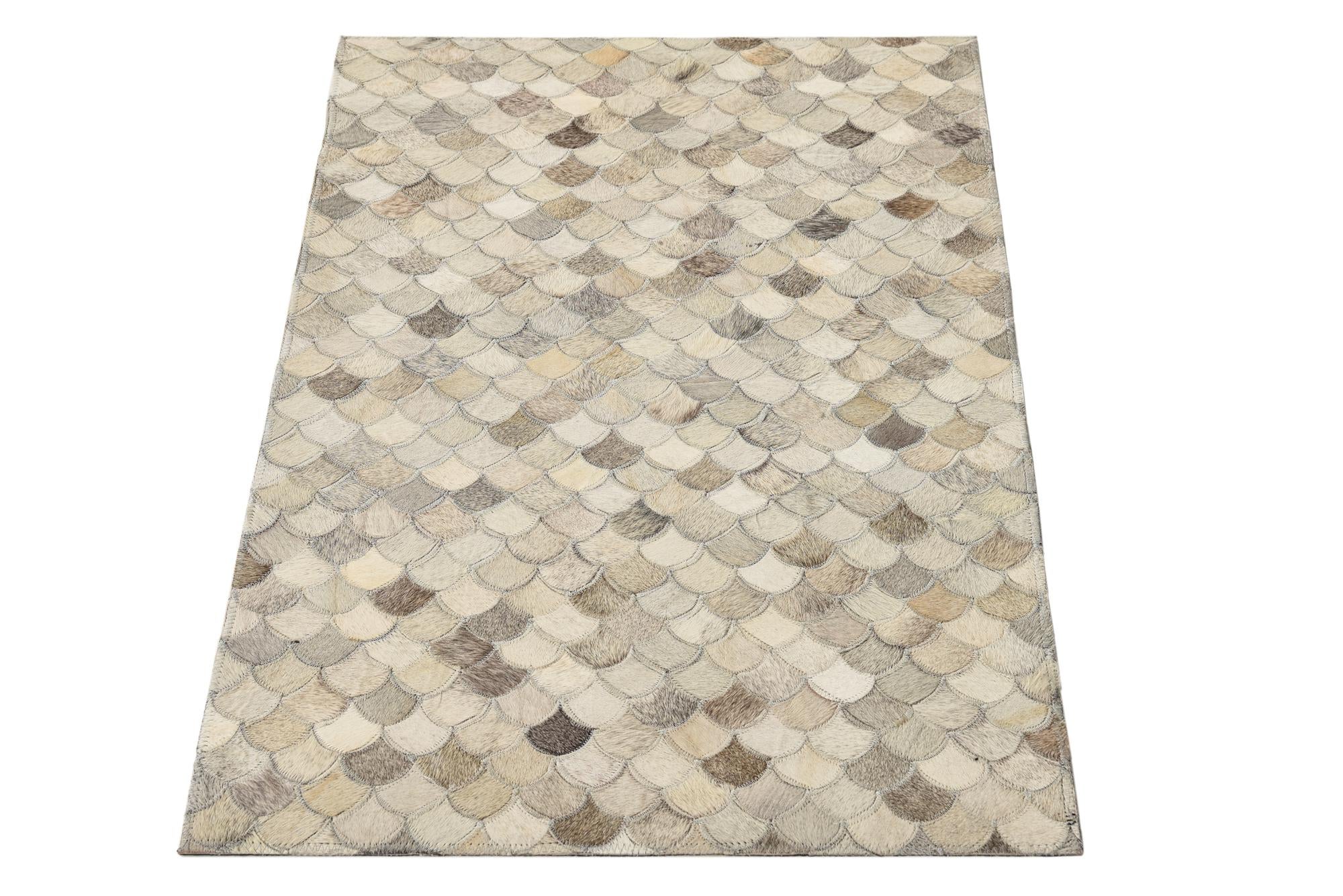 2' 1 x 3' Cowhide Rug
