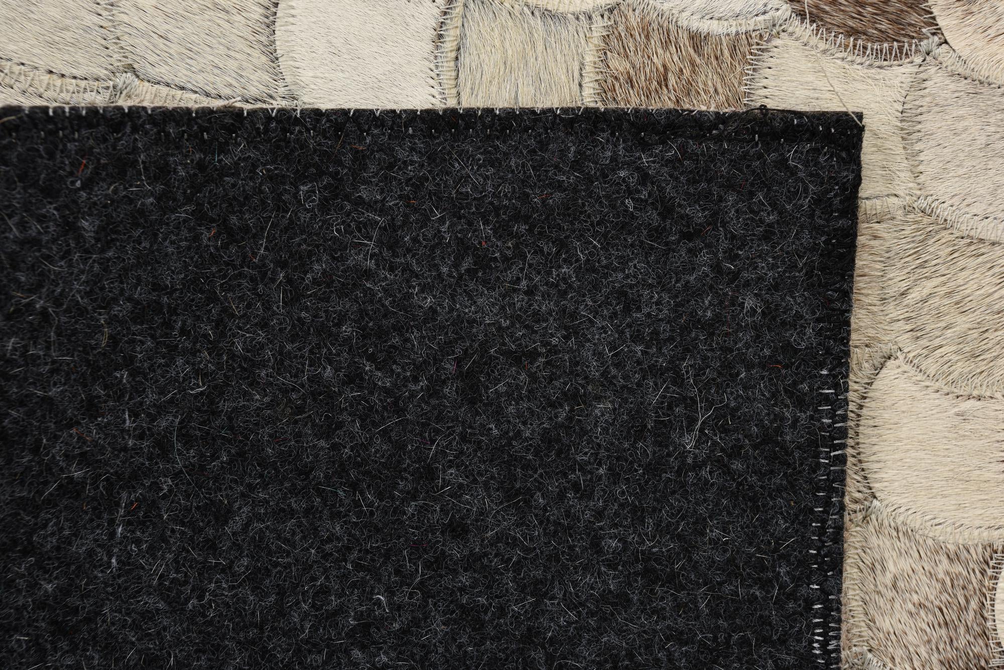 2' 1 x 3' Cowhide Rug