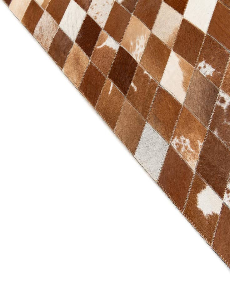 Detail image of 5' x 7' 11 Cowhide Stocks Rug