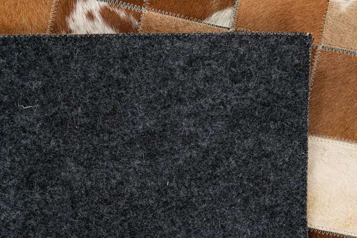 5' x 7' 11 Cowhide Stocks Rug