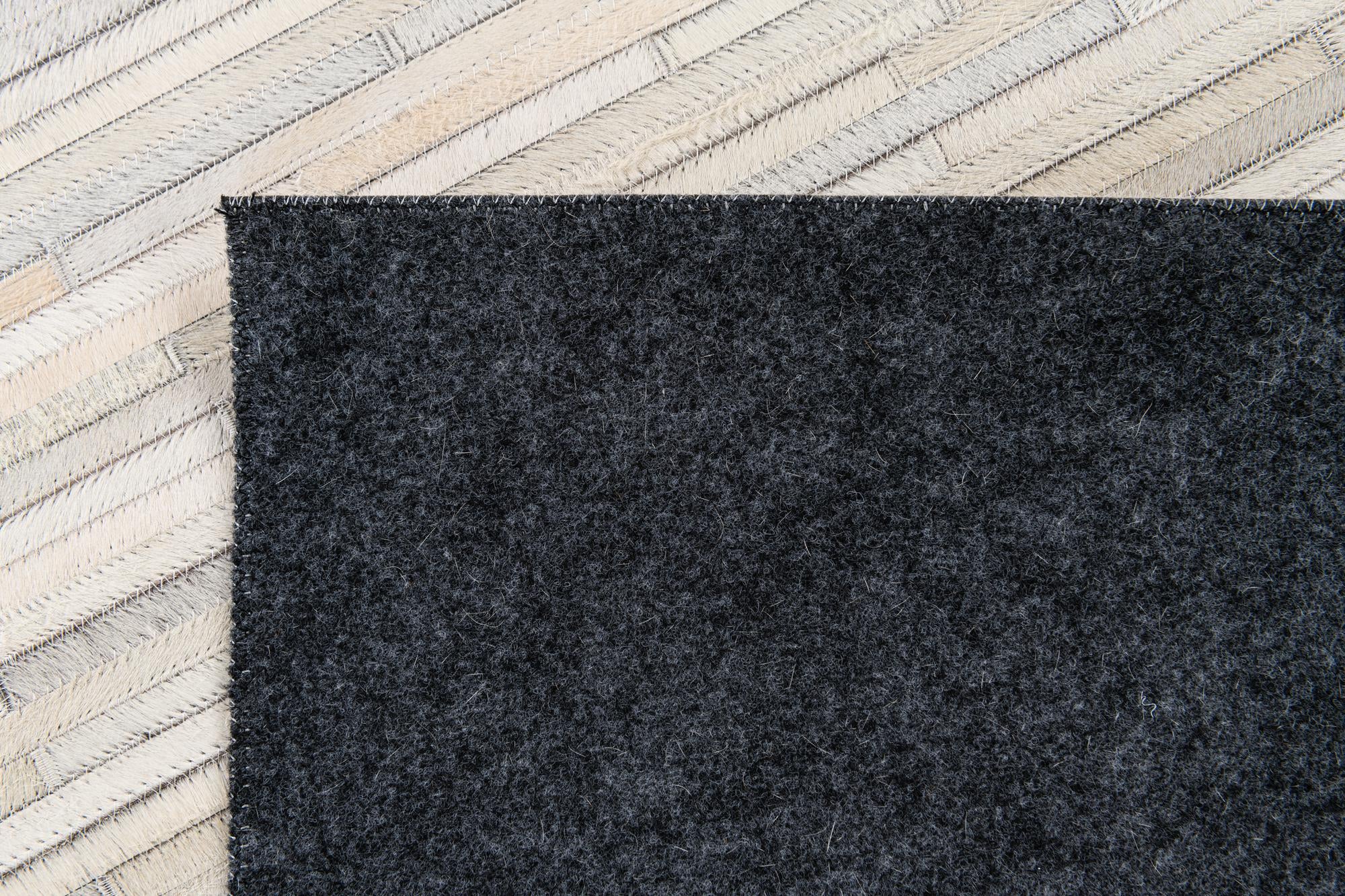 5' x 8' Cowhide Stocks Rug