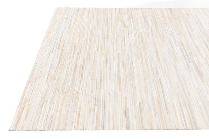 5' 1 x 7' 11 Cowhide Stocks Rug
