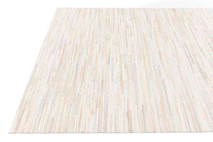 Detail image of 5' 1 x 7' 11 Cowhide Stocks Rug
