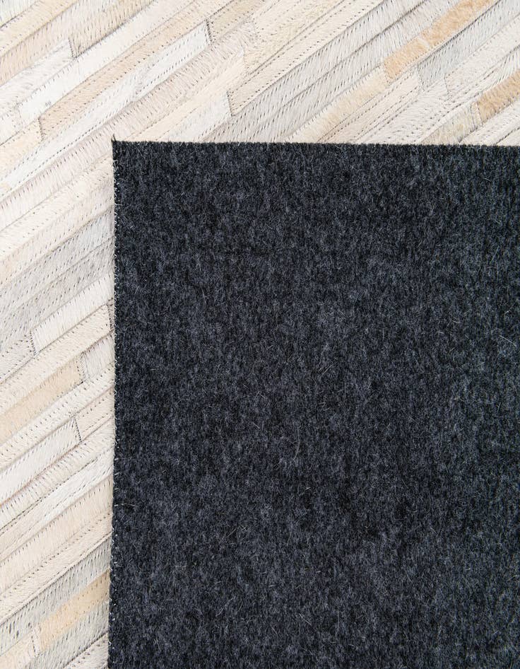 Detail image of 5' 1 x 7' 11 Cowhide Stocks Rug