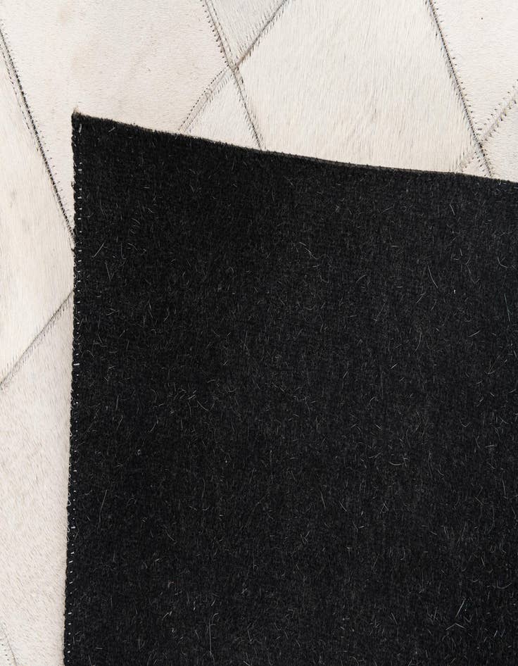 Detail image of 4' x 5' 10 Cowhide Stocks Rug