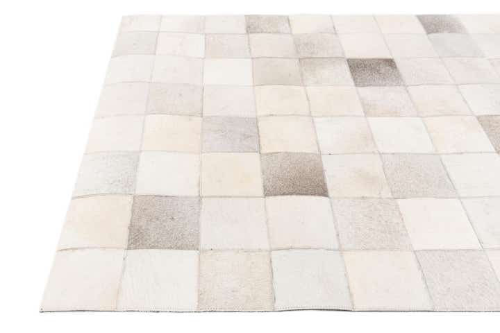 3' 11 x 5' 10 Cowhide Stocks Rug