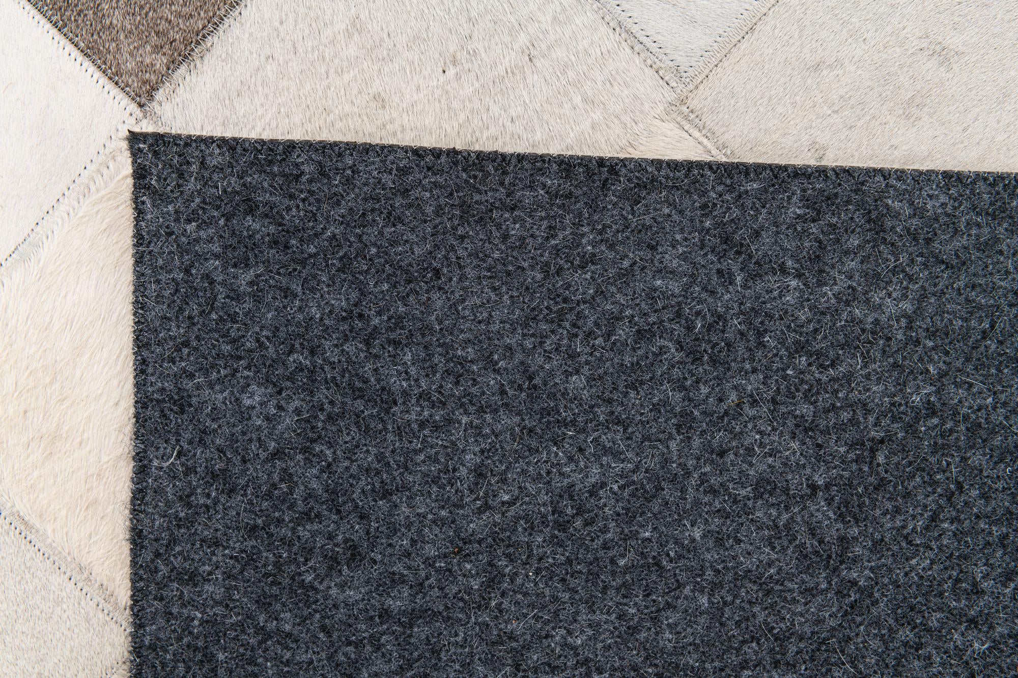 3' 11 x 5' 10 Cowhide Stocks Rug