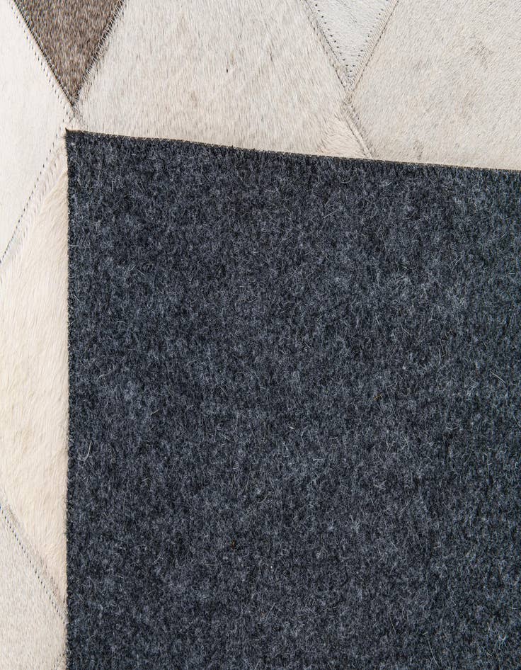 Detail image of 3' 11 x 5' 10 Cowhide Stocks Rug