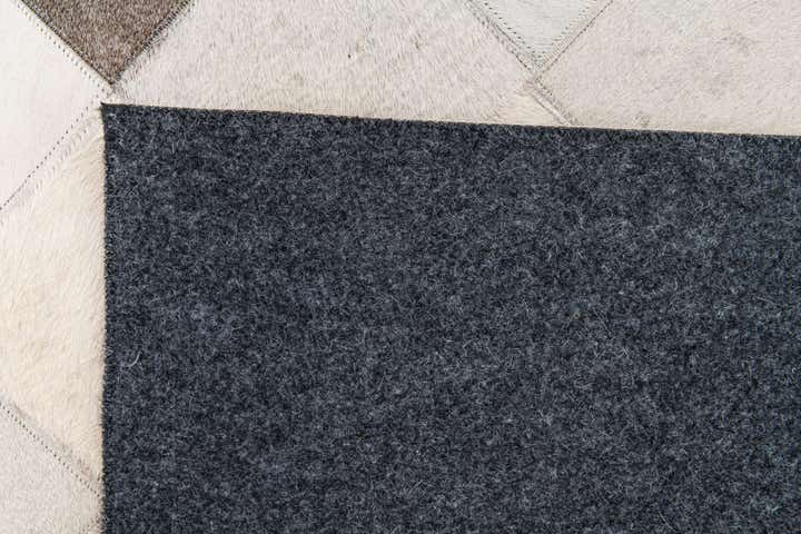 3' 11 x 5' 10 Cowhide Stocks Rug