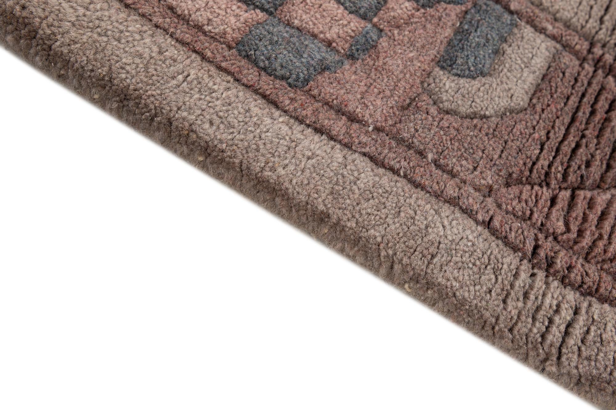 4' x 5' 10 Hand Knotted Tibet Wool Rug