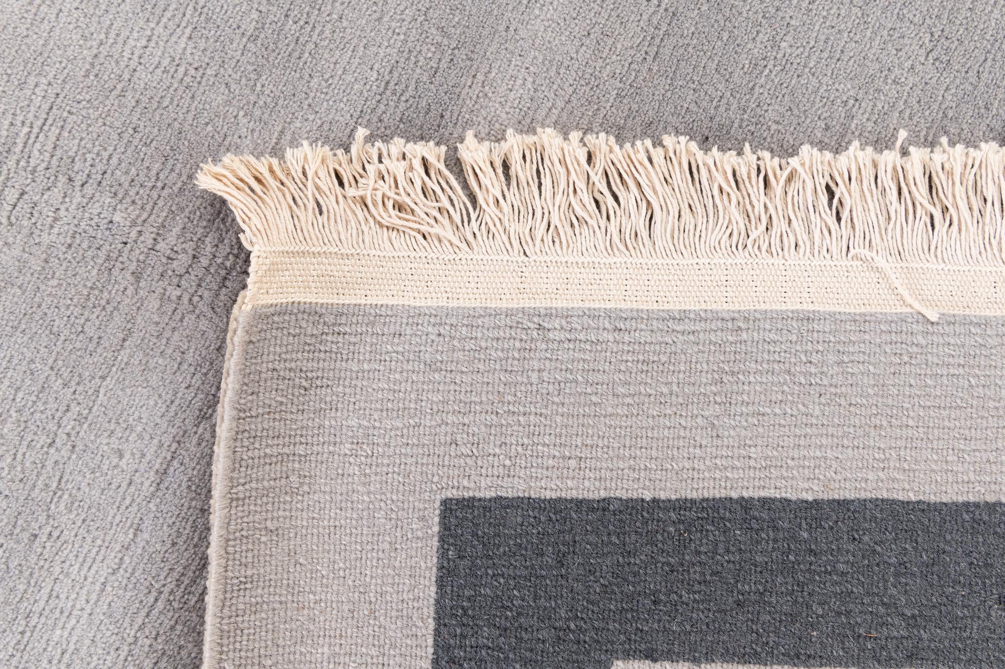 5' 8 x 7' 9 Hand Knotted Tibet Wool Rug