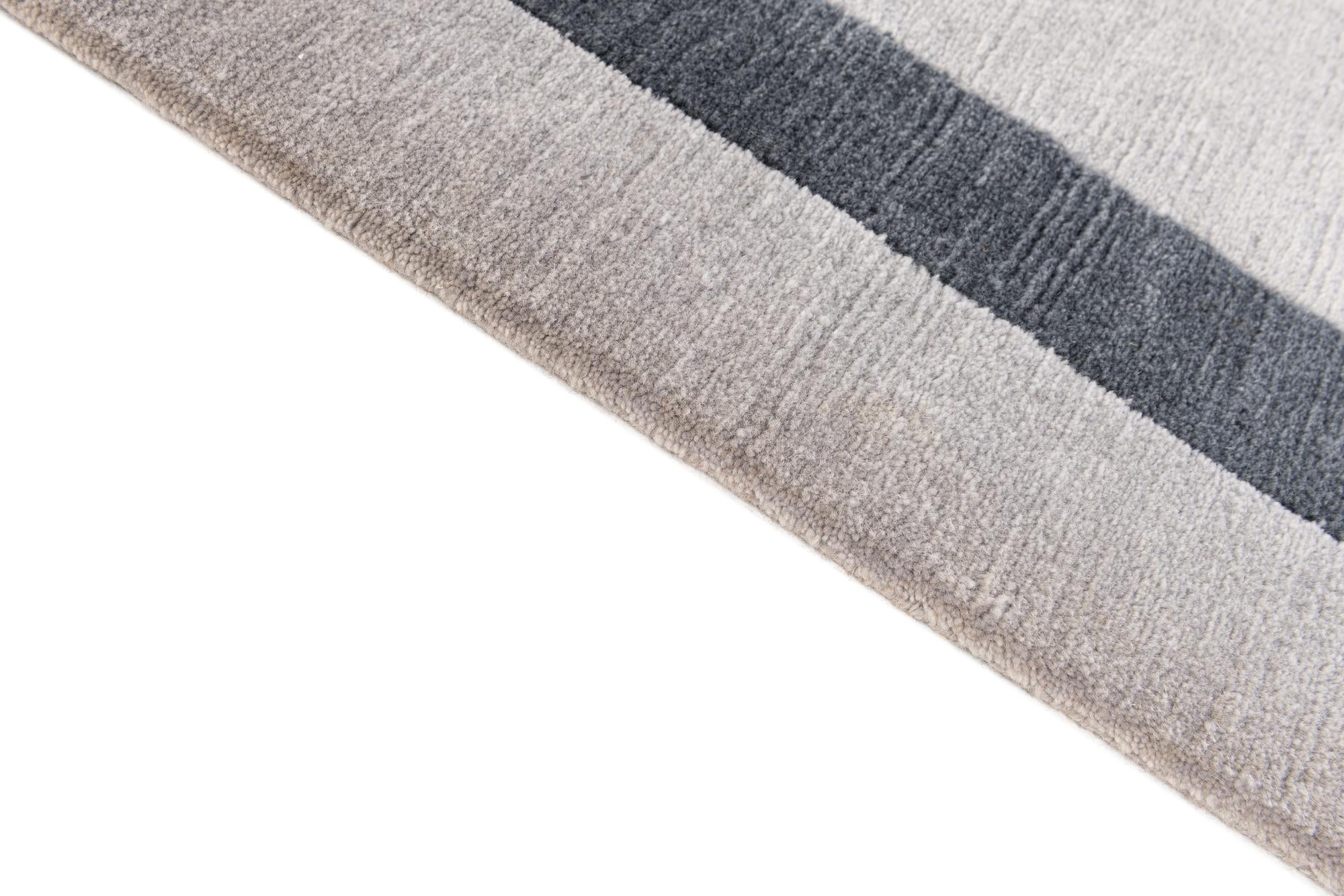 5' 8 x 7' 9 Hand Knotted Tibet Wool Rug