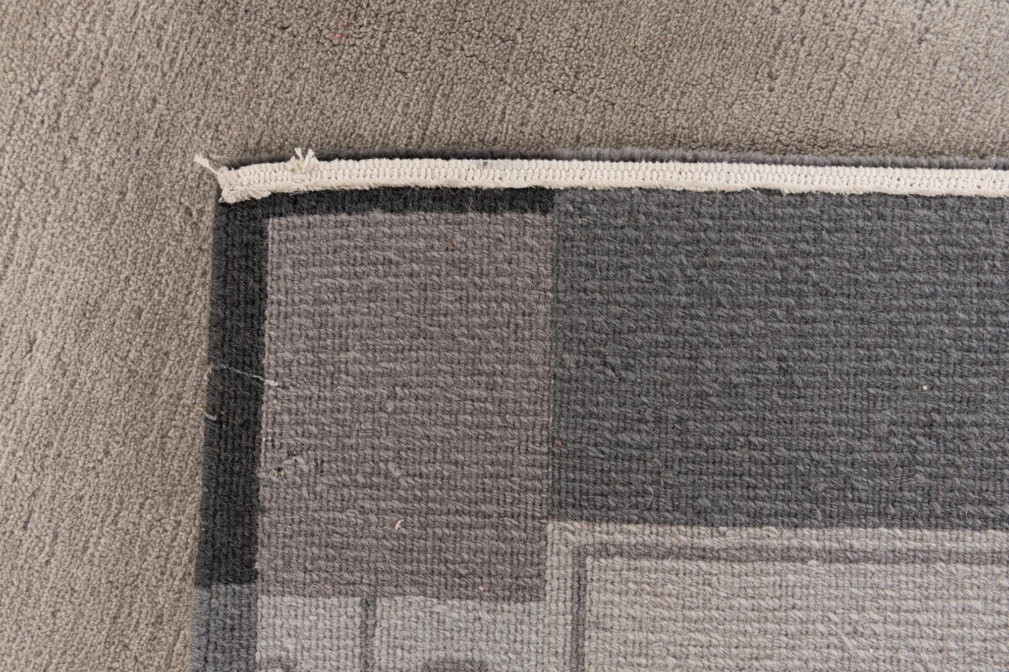 5' 8 x 7' 10 Hand Knotted Tibet Wool Rug