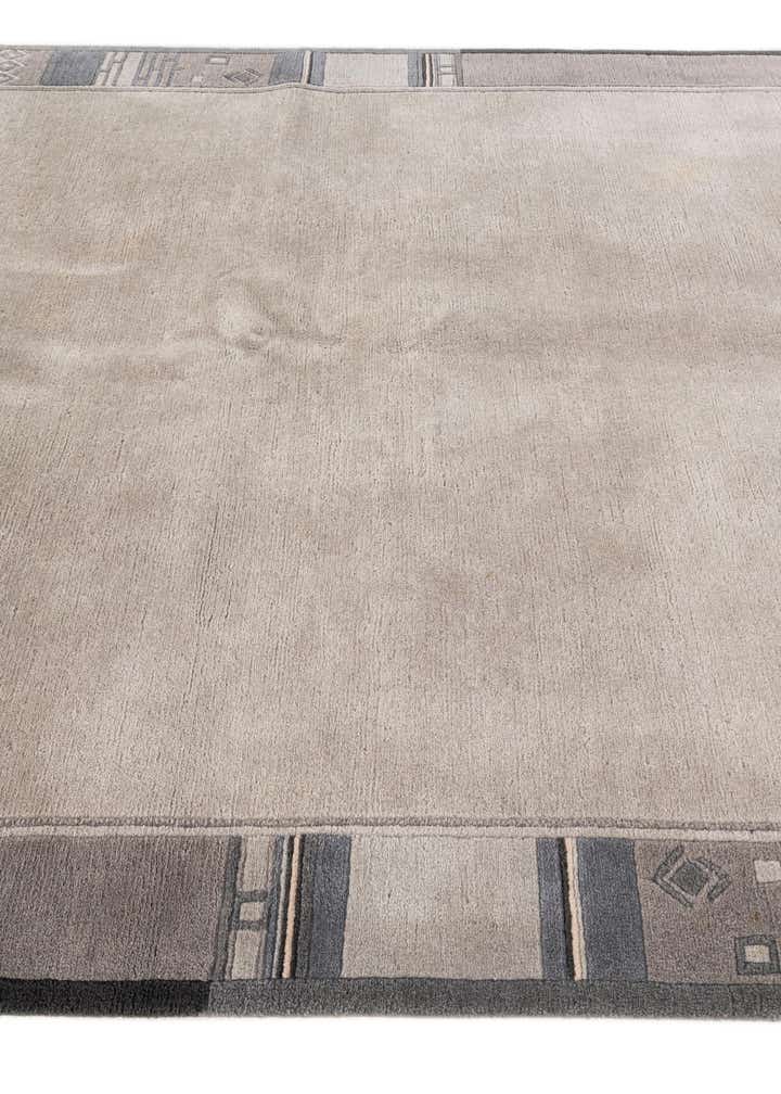 5' 8 x 7' 10 Hand Knotted Tibet Wool Rug