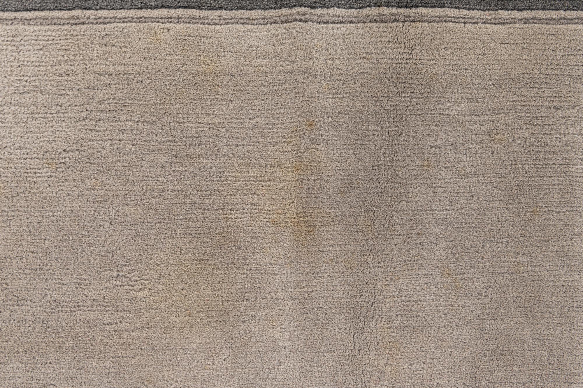 5' 8 x 7' 10 Hand Knotted Tibet Wool Rug