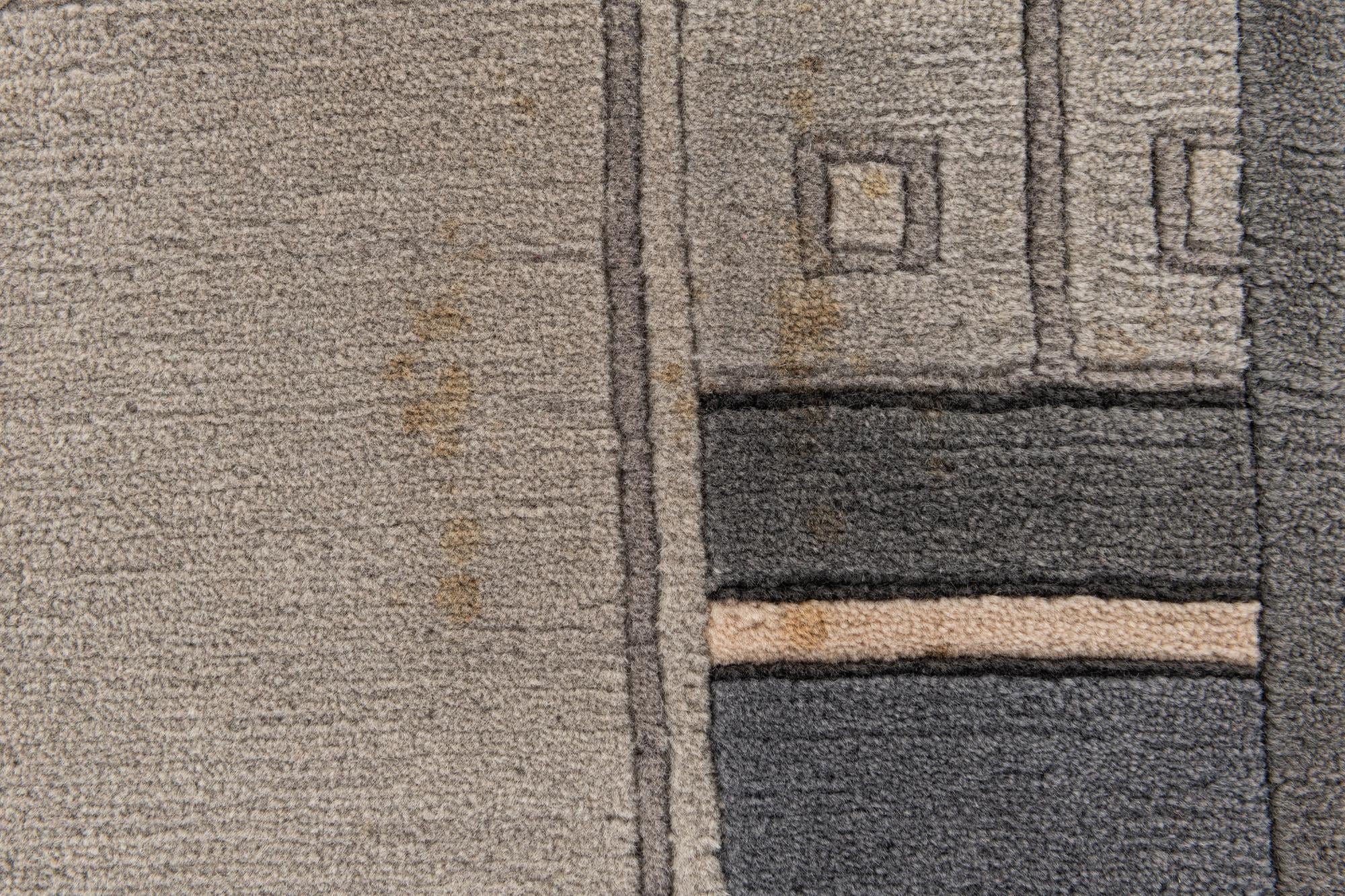 5' 8 x 7' 10 Hand Knotted Tibet Wool Rug