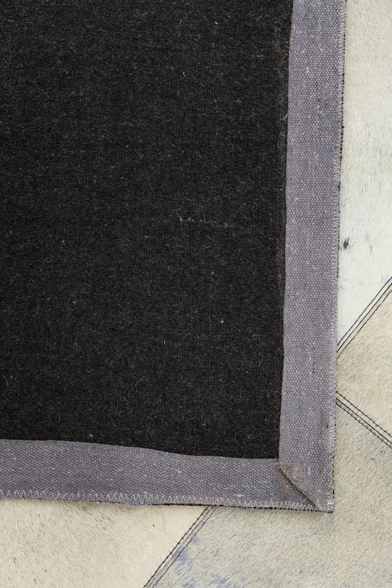5' x 7' 9 Cowhide Leather Rug