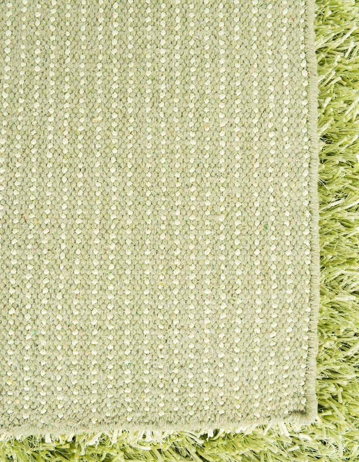 Detail image of 5' x 6' 6  Hand Knotted Solid Shag Rug