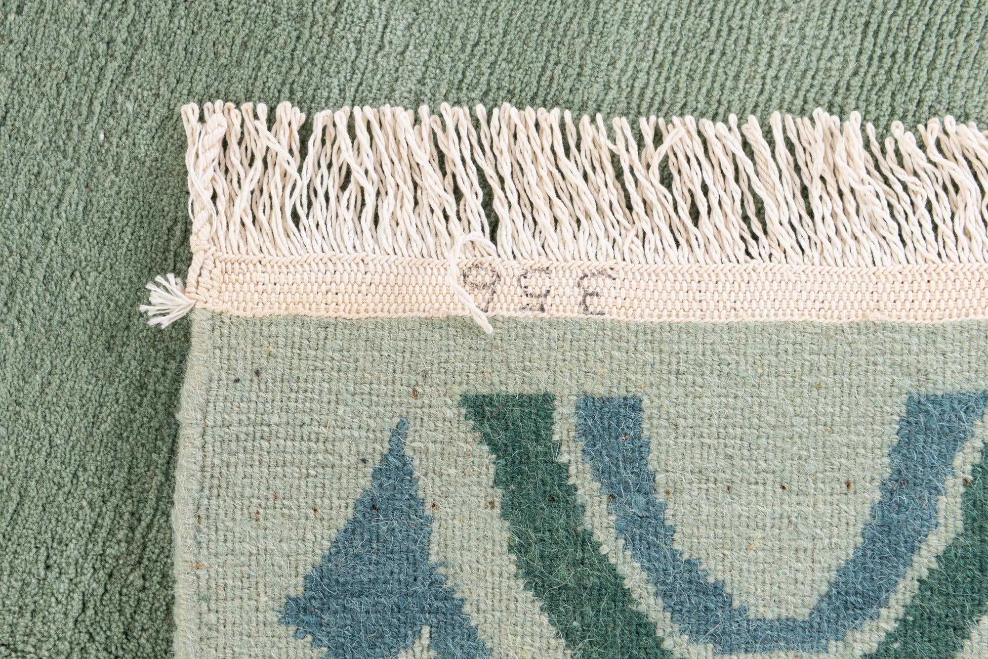 5' 5 x 7' 6 Hand Knotted Tibet Wool Rug