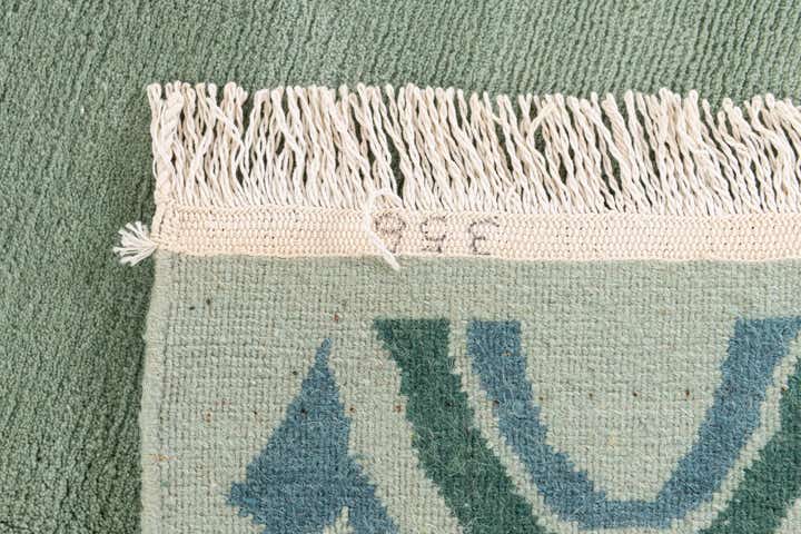 5' 5 x 7' 6 Hand Knotted Tibet Wool Rug