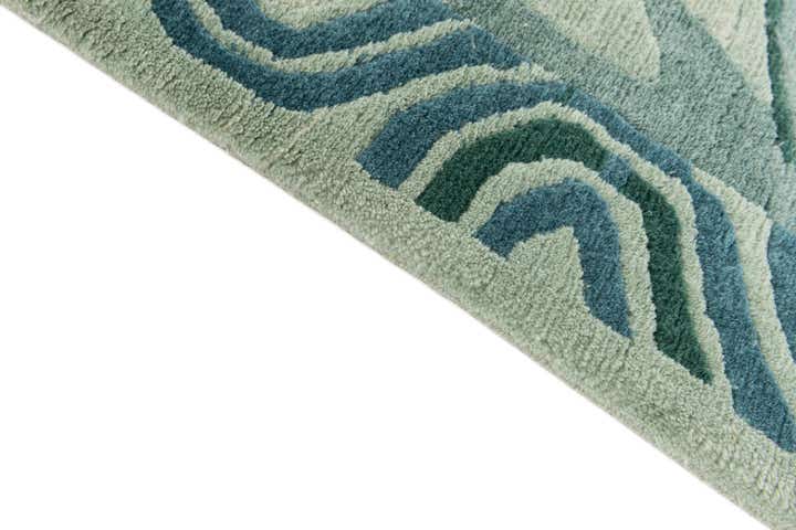 5' 5 x 7' 6 Hand Knotted Tibet Wool Rug