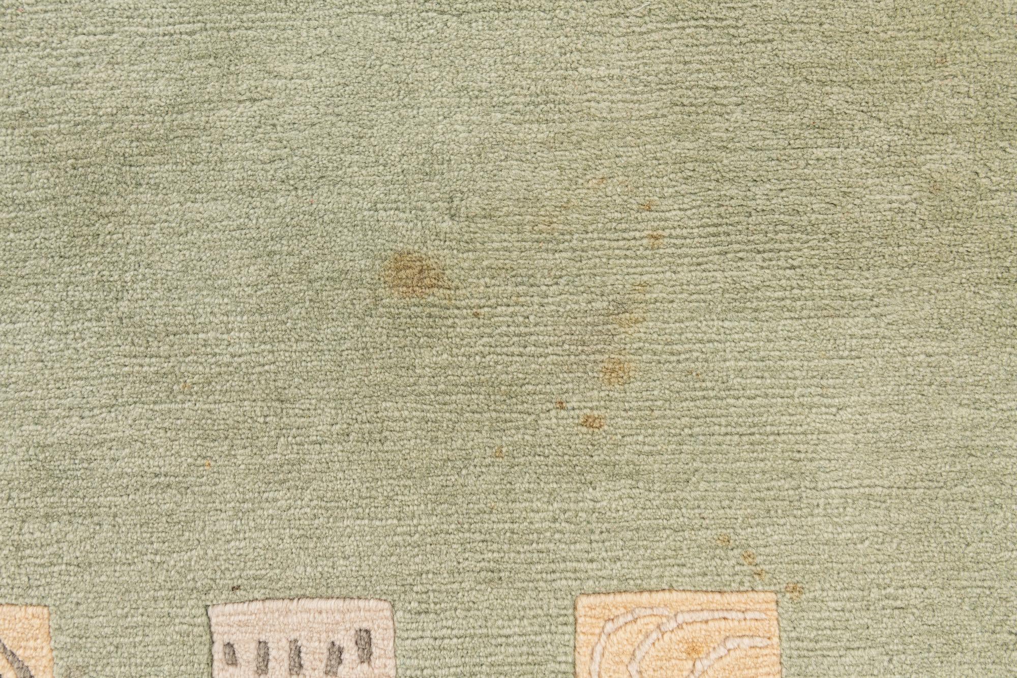 5' 9 x 7' 9 Hand Knotted Tibet Wool Rug