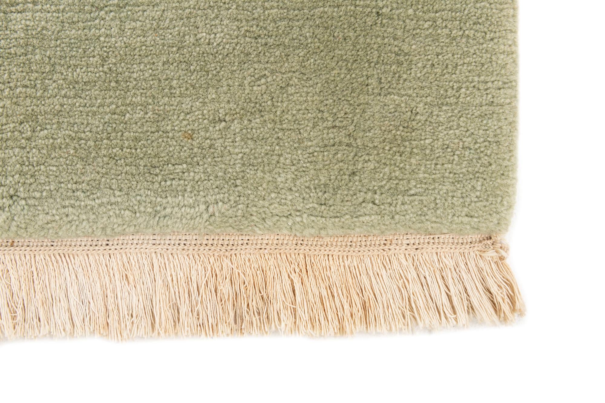5' 9 x 7' 9 Hand Knotted Tibet Wool Rug