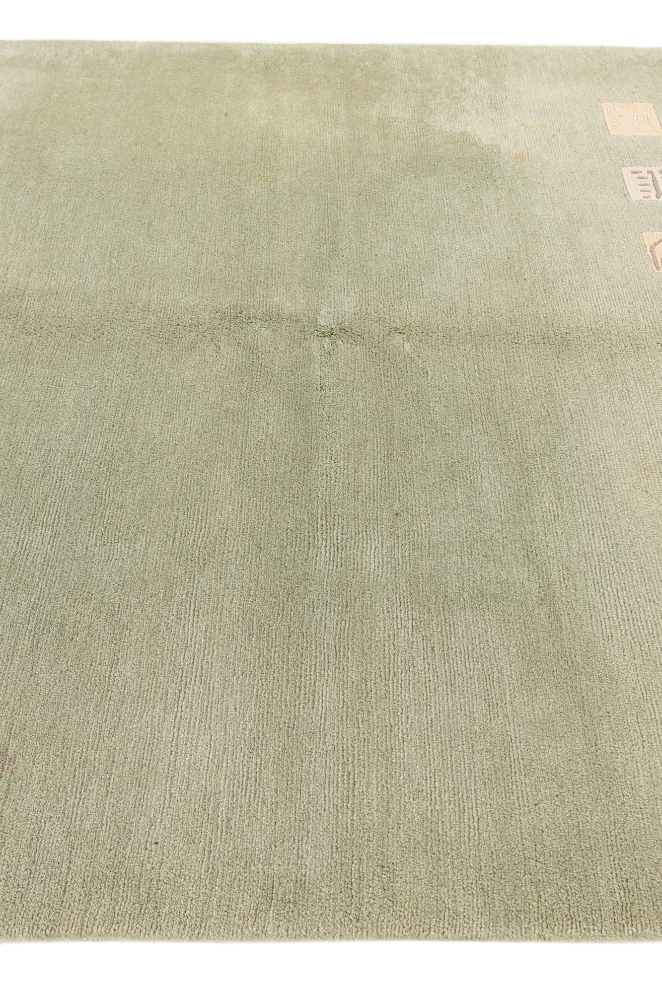 5' 9 x 7' 9 Hand Knotted Tibet Wool Rug